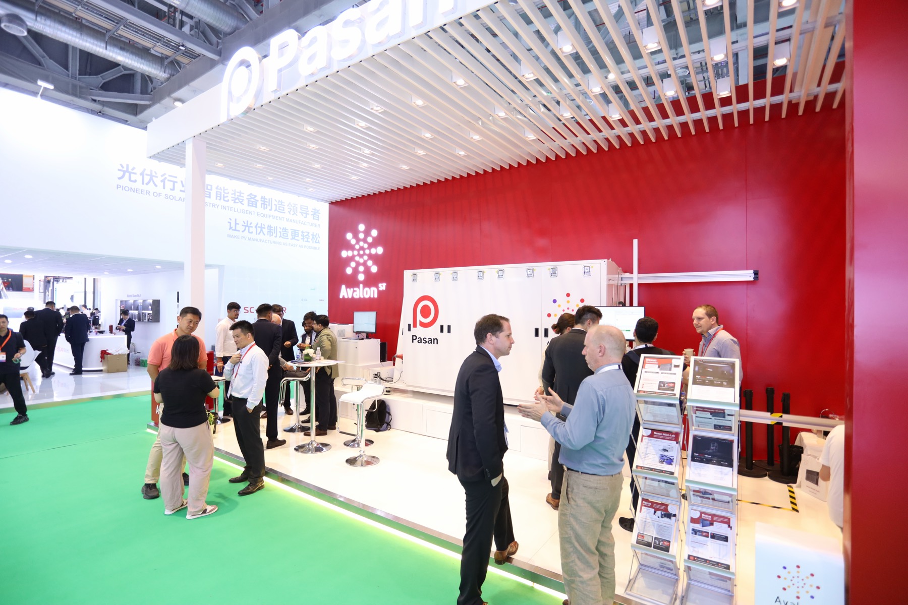 Visitors at the Pasan and Avalon ST booth during SNEC 2026